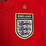 ⚪🔴 England 2006–08 Auswärtstrikot – David Beckham #7 – Umbro (M)