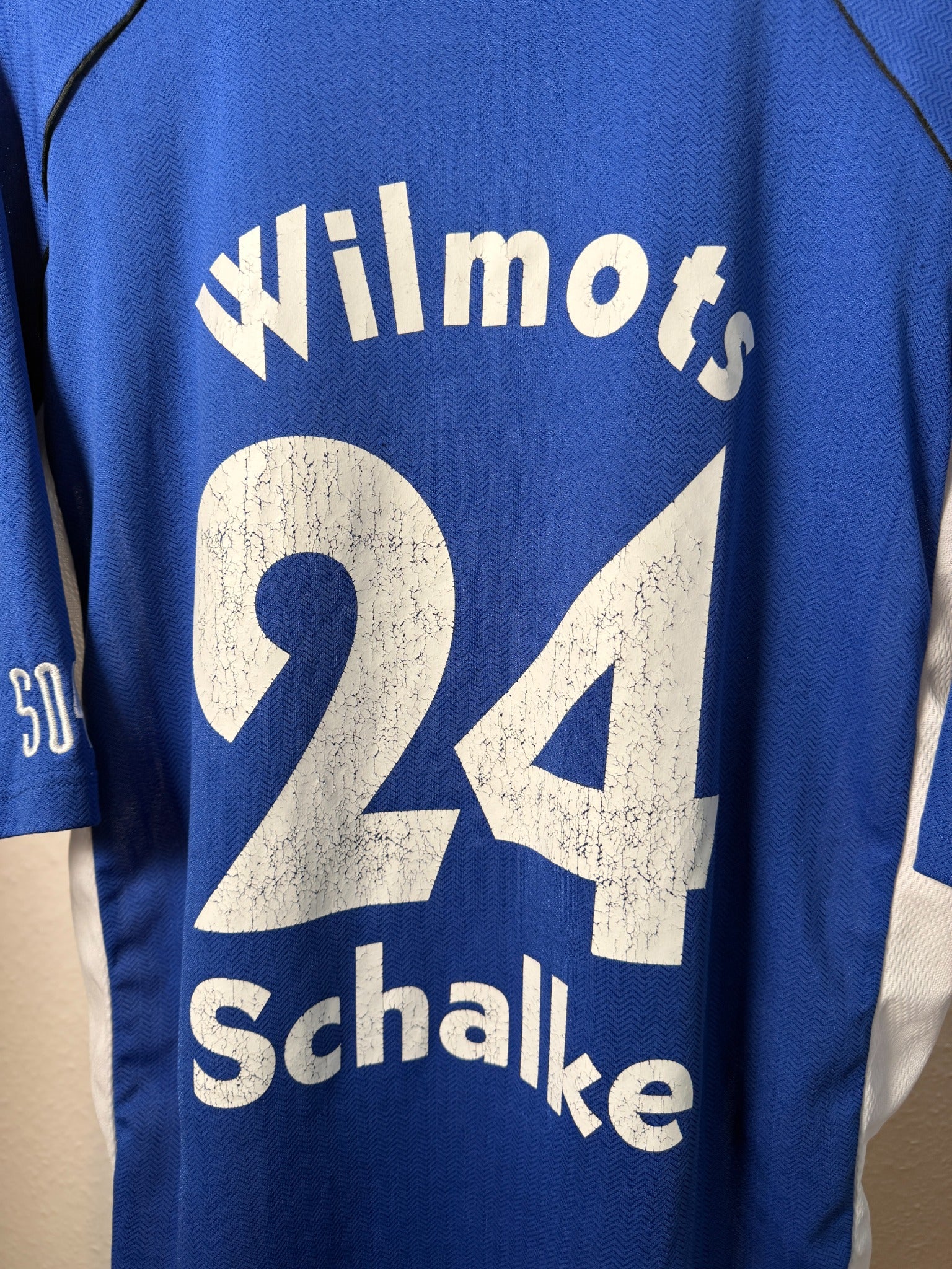 Originaler Wilmots #24 Spielerflock mit altersbedingten Rissen